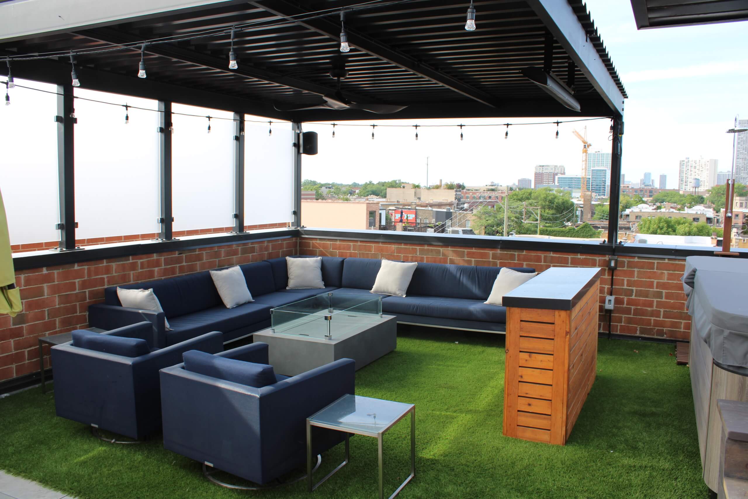 Outdoor living room with heated pergola and fire pit Outdoor living room with heated pergola and fire pit in Chicago il