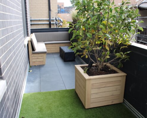 rooftop balcony with built-in planter and seating wicker park chicago