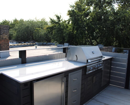 Rooftop deck buffet with grill, fridge, and trash ravenswood chicago il