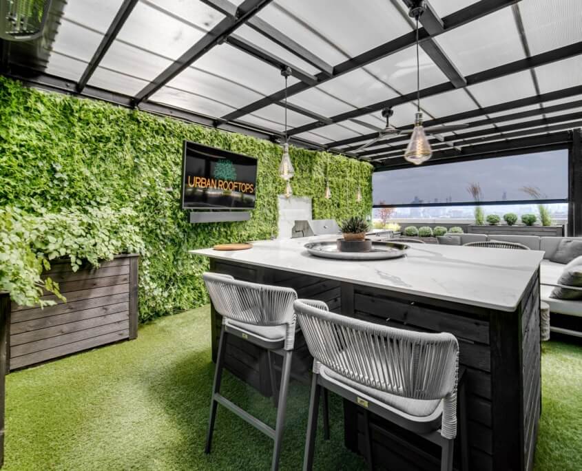 Covered rooftop lounge island seating