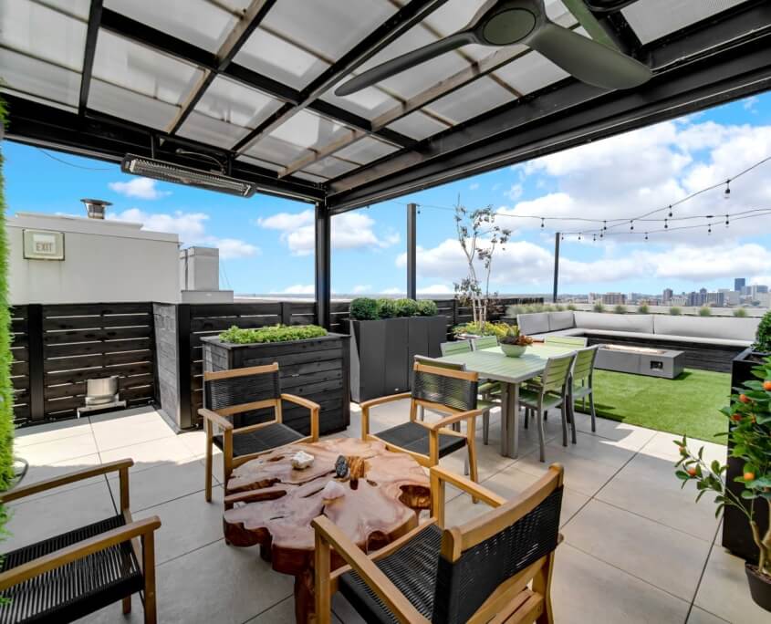 rooftop deck beneath pergola