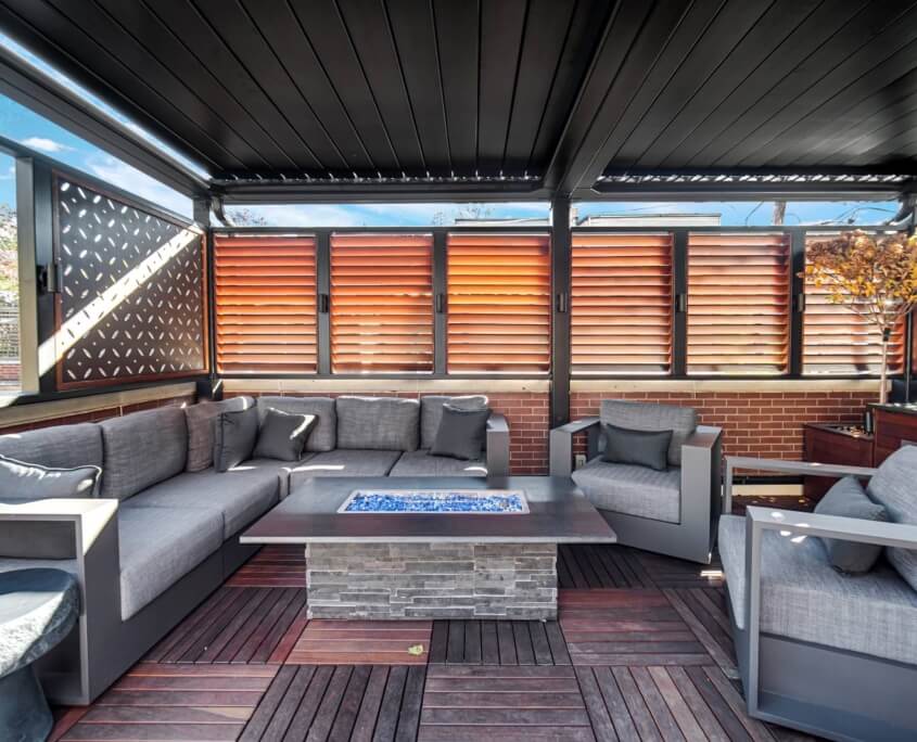Covered lounge with a fire pit